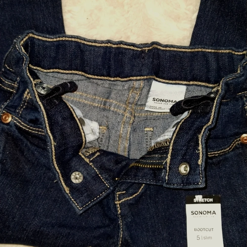 NEW w/sticker boot cut/flared dark denim jeans size 5